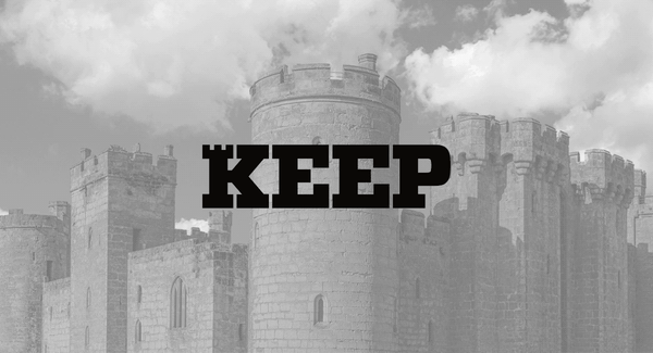 Castle with the KEEP logo on top with clouds moving in the background